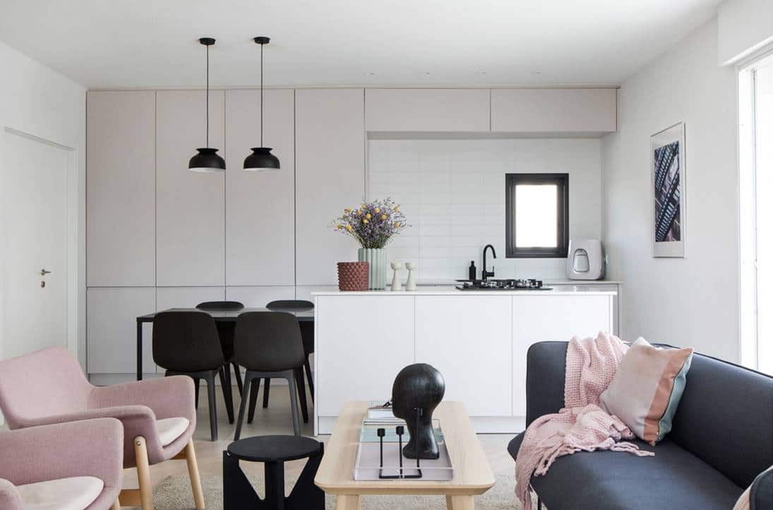 Soggiorno con cucina a vista stile moderno